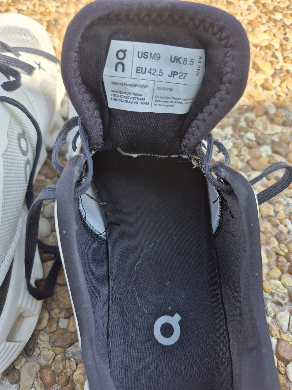 On Running Men’s Cloud Athletic Sneakers in White and Black